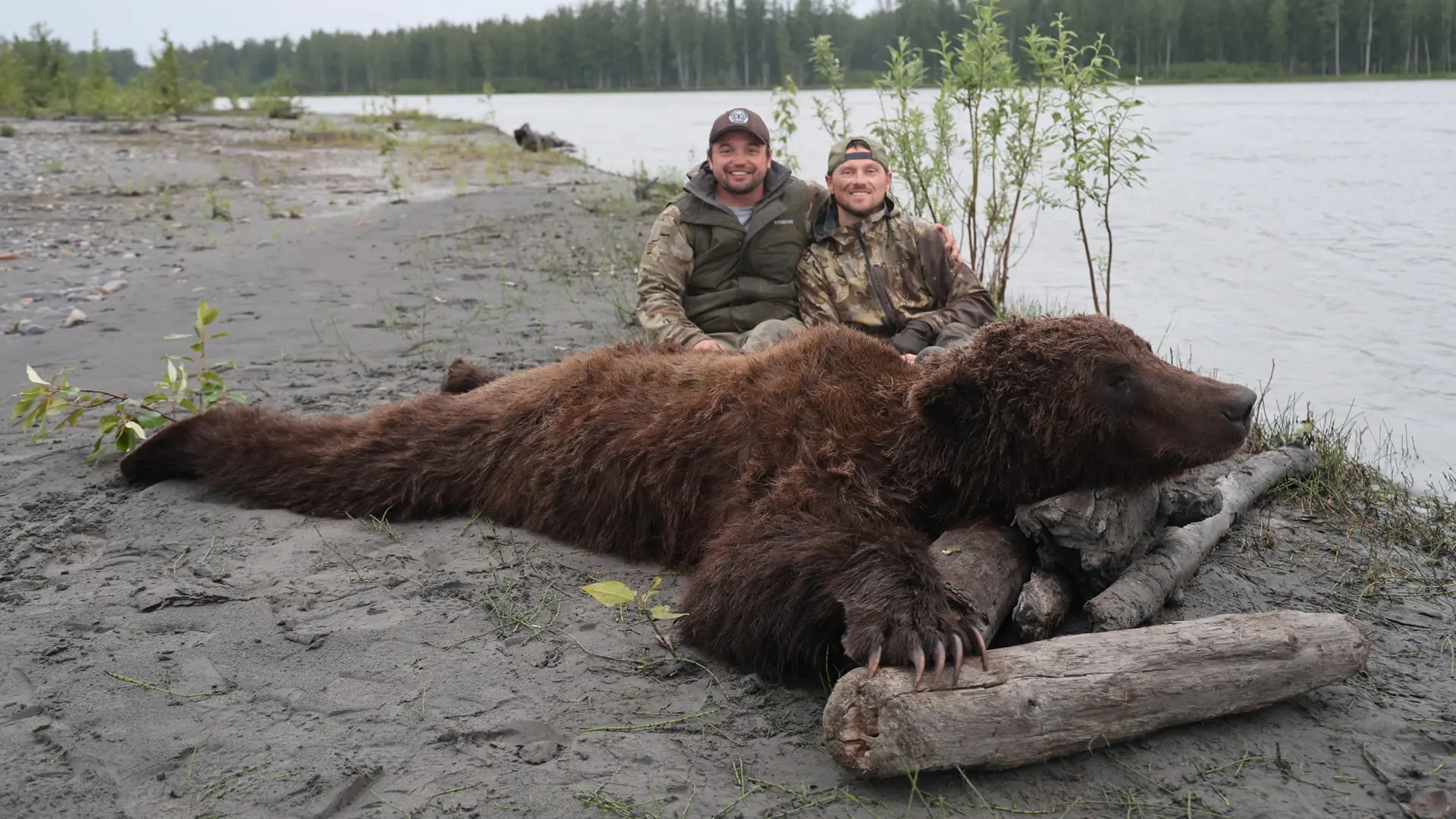 Austin Manelick with a bear
