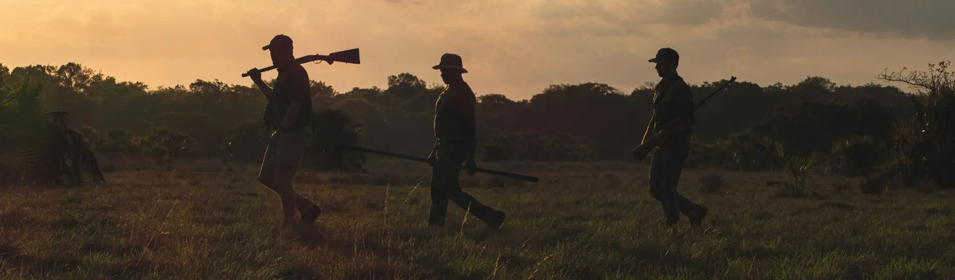 Silhouetted Hunters