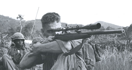 A USMC sniper uses his Model 70