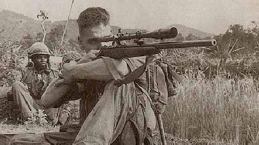 Soldier shooting Winchester Rifle
