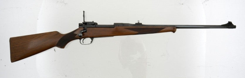 Model-E-2536 bolt-action rifle.