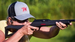 woman shooting Winchester Wildcat 22 Rifle