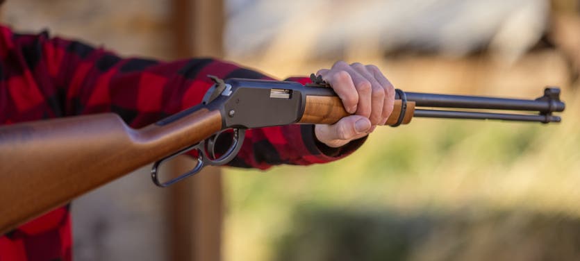 Shooter holding up ranger rifle